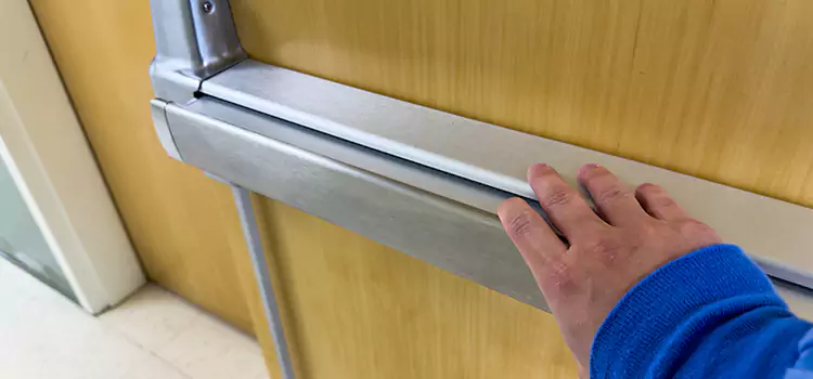 Installing a Push Bar on a Door Muncie